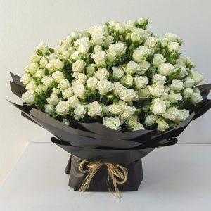 White_baby_rose_bloom_by_mayfair_qatar
